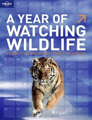 Cover for A Year Of Watching Wildlife A Guide To The Worlds Best Animal Encounters