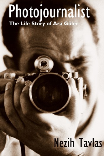 Cover for PHOTOJOURNALIST