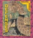 Cover for Defenses (Grambo, Rebecca L. Amazing Animals.)