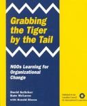 Cover for Grabbing the Tiger by the Tail