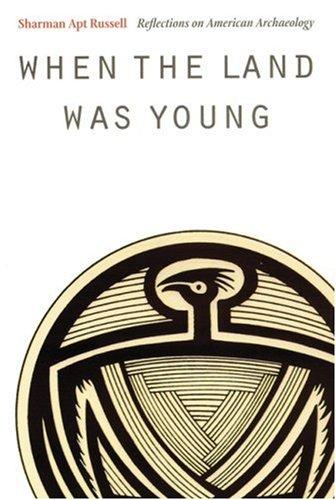 Cover for When the land was young