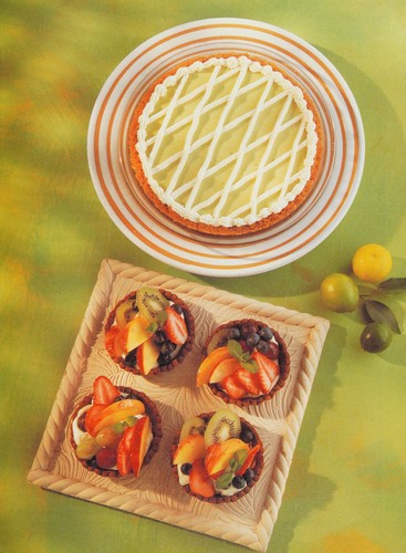Cover for The Practical Encyclopedia of Baking Over 400 Step-by-step Recipes with Over 1,500 Photographs.