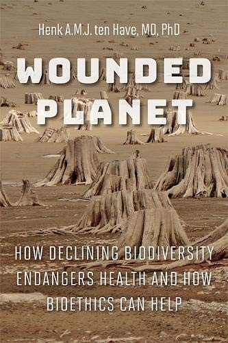 Cover for Wounded Planet
